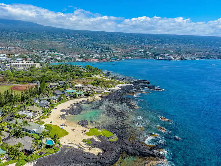 Stunning aerial view of the Kailua-Kona coastline and Kona Bay Estates neighborhood, close proximity to Keiki beach