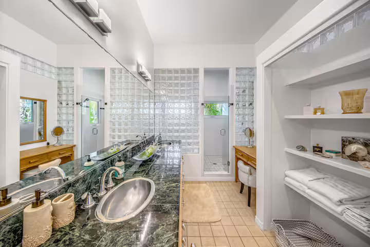 Master bathroom with granite countertops and premium fixtures